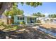 Charming single-story home featuring a well-manicured lawn, fresh paint, and a welcoming front porch at 4531 7Th N Ave, St Petersburg, FL 33713