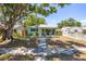 Charming single-story home featuring a well-manicured lawn, fresh paint, and a welcoming front porch at 4531 7Th N Ave, St Petersburg, FL 33713