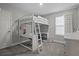 Bedroom with a ladder loft bed, a vanity, and a window with blinds at 4770 Ballantrae Blvd, Land O Lakes, FL 34638