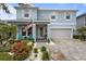Charming two-story home with a well-manicured front yard and paved driveway at 4770 Ballantrae Blvd, Land O Lakes, FL 34638