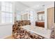 Bathroom features a large soaking tub, tiled surround, and vanity at 509 Falmouth St, Temple Terrace, FL 33617