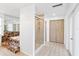 Bathroom featuring large soaking tub, shower, and closet space at 509 Falmouth St, Temple Terrace, FL 33617