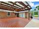 This covered deck has plenty of room for entertaining and is perfect for relaxing with friends and Gathering at 509 Falmouth St, Temple Terrace, FL 33617