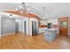 Spacious kitchen featuring stainless steel appliances, white cabinets, and a large island at 509 Falmouth St, Temple Terrace, FL 33617