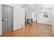 Spacious living room featuring wood floors, recessed lighting and views to the kitchen at 509 Falmouth St, Temple Terrace, FL 33617