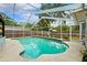 This screened-in pool is perfect for relaxing and swimming laps on those hot summer days at 509 Falmouth St, Temple Terrace, FL 33617