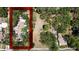 Aerial view showcases the home's large lot surrounded by lush greenery at 5680 77Th N Ave, Pinellas Park, FL 33781