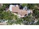 Overhead view shows a well-maintained home with mature landscaping and a private driveway at 5680 77Th N Ave, Pinellas Park, FL 33781