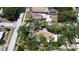 Aerial view of the residence nestled within a lush green, tree-filled neighborhood at 5680 77Th N Ave, Pinellas Park, FL 33781