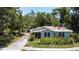A charming one-story home with a well-kept yard and a driveway leading to the street at 5680 77Th N Ave, Pinellas Park, FL 33781