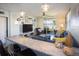 Cozy living room with stylish decor, comfortable seating, and views of the water at 5701 Bahia Del Mar Cir # 108, St Petersburg, FL 33715
