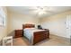 Neutral bedroom with carpet, ceiling fan, and natural light from window at 6100 Gulfport S Blvd # 415, Gulfport, FL 33707
