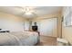 Comfortable bedroom featuring carpet, large closet, and ceiling fan at 6100 Gulfport S Blvd # 415, Gulfport, FL 33707