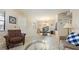 Inviting living room featuring tile floors, modern furniture, and a cozy dining area at 6100 Gulfport S Blvd # 415, Gulfport, FL 33707