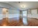 Spacious living room boasts high ceilings, hardwood floors, and natural light at 6145 103Rd N Ave, Pinellas Park, FL 33782