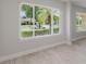 Light filled room with tiled floors and a large window at 6573 20Th N St, St Petersburg, FL 33702