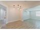 Bright dining room features light-colored floors and modern lighting fixtures at 6573 20Th N St, St Petersburg, FL 33702