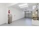 Spacious garage with epoxy floors, bright lighting, and plenty of room for storage or parking at 6573 20Th N St, St Petersburg, FL 33702