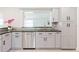 Beautiful kitchen with stainless steel dishwasher, new faucet and modern cabinets at 6573 20Th N St, St Petersburg, FL 33702