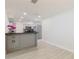 Modern kitchen with granite countertop and stainless steel appliances at 6573 20Th N St, St Petersburg, FL 33702