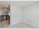 Living room with light tile floors and an open concept layout to the kitchen at 6573 20Th N St, St Petersburg, FL 33702
