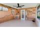 Nautical themed patio with a ceiling fan, wet bar, and bamboo accents at 6573 20Th N St, St Petersburg, FL 33702