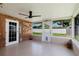 Patio with a ceiling fan, views of the backyard, and lots of natural light at 6573 20Th N St, St Petersburg, FL 33702
