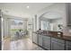 Charming eat-in kitchen features stainless steel appliances, granite counters, and a sunlit breakfast nook at 7732 Bulls Head Dr, Wesley Chapel, FL 33545