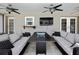Well-appointed outdoor seating area with comfortable sofas and a view of the pool at 7818 Holiday Dr, Spring Hill, FL 34606