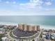 Panoramic aerial showcasing the beachfront condo, coastline and lush surroundings of the neighborhood at 880 Mandalay Ave # N607, Clearwater Beach, FL 33767