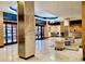 Elegant condo lobby with marble floors, stylish seating and a reception area for residents and guests at 880 Mandalay Ave # N607, Clearwater Beach, FL 33767