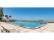 Large outdoor pool with lounge chairs and direct ocean views, ideal for swimming laps at 880 Mandalay Ave # N607, Clearwater Beach, FL 33767