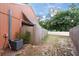 View of the side of the house with a fence and AC unit at 9466 Forest Hills Cir, Tampa, FL 33612