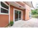 Cozy patio with sliding glass doors and ample sunlight, creating a seamless transition to the outdoors at 9466 Forest Hills Cir, Tampa, FL 33612