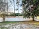 Large backyard space with a new fence line at 9735 Riverchase Dr, New Port Richey, FL 34655