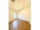 Bedroom features tile floors and a window for natural light at 9735 Riverchase Dr, New Port Richey, FL 34655