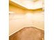 Walk-in closet with built-in shelving and ample storage space at 9735 Riverchase Dr, New Port Richey, FL 34655