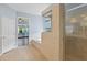 Bright bathroom with a glass shower and garden tub at 10205 Deercliff Dr, Tampa, FL 33647