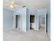 Spacious bedroom with a large closet and an ensuite bathroom for privacy and convenience at 10205 Deercliff Dr, Tampa, FL 33647