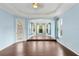 Relax in this bonus room, complete with wood flooring and multiple windows at 10205 Deercliff Dr, Tampa, FL 33647