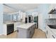 Modern kitchen featuring stainless steel appliances, granite countertops, and a center island at 10205 Deercliff Dr, Tampa, FL 33647
