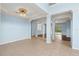 Open living area with tile floors and backyard access at 10205 Deercliff Dr, Tampa, FL 33647