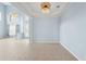 Open floor plan with high ceilings and tile flooring at 10205 Deercliff Dr, Tampa, FL 33647
