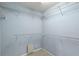 This walk-in closet has metal shelving for optimal storage at 10205 Deercliff Dr, Tampa, FL 33647
