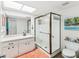 Full bathroom featuring a shower with a glass enclosure and light-colored vanity at 10216 Regal Dr # 409, Largo, FL 33774