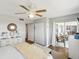 Bright bedroom with large sliding doors to the patio area and two storage closets at 10216 Regal Dr # 409, Largo, FL 33774