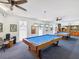 Well-lit billiards room offering a relaxing area for recreation and socializing at 10216 Regal Dr # 409, Largo, FL 33774