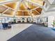 Spacious clubhouse with high ceilings, ceiling fans, and ample room for gatherings and events at 10216 Regal Dr # 409, Largo, FL 33774