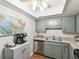 Compact kitchen with stainless steel dishwasher at 10216 Regal Dr # 409, Largo, FL 33774