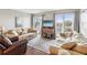 Comfortable living room featuring neutral colors and an abundance of natural light at 10216 Regal Dr # 409, Largo, FL 33774